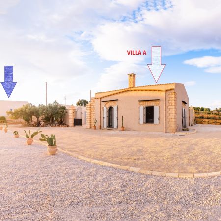 The two restored units: the former baglio (A) and the former peasant house (B)